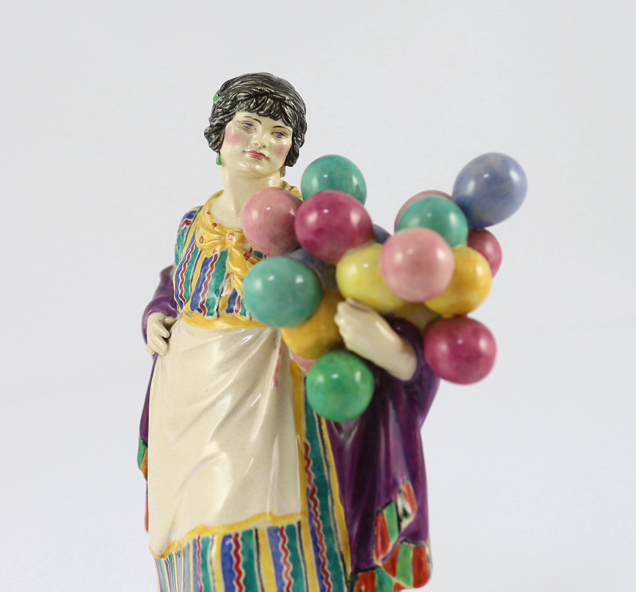 Charles Vyse (1882-1971) - a Chelsea Pottery figure, 'The Balloon Woman'